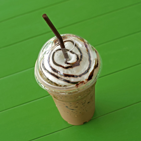 cold drink chocolate frappuccino in takeaway cupの写真素材