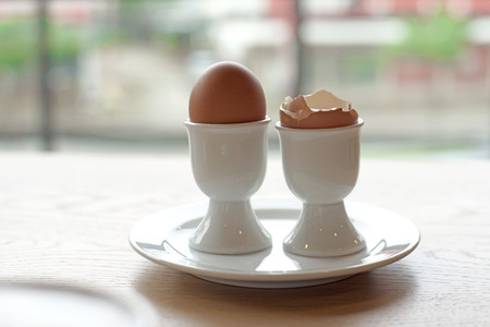 soft boiled egg in eggcup for breakfast meal
