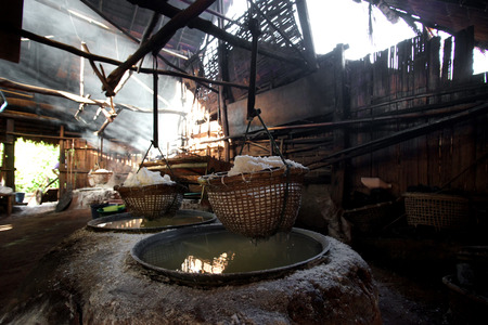 boiling rock salt, traditional salt making of nan province,Thailandの写真素材