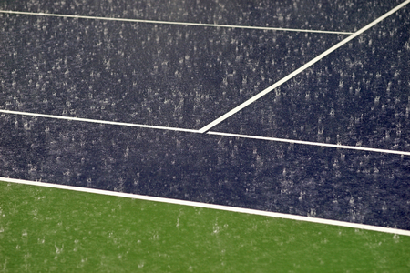 heavy rain on tennis court the competition must stopの写真素材