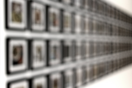 blurry photo of picture frame on white wallの写真素材