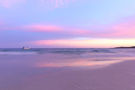 landscape photo, beautiful sunset over the sea beachの写真素材