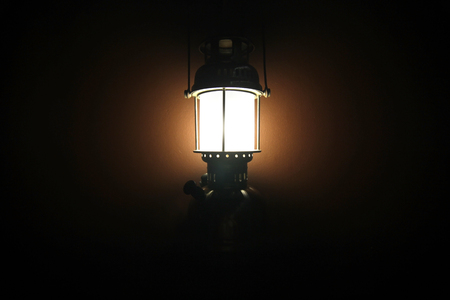 vintage lantern lamp isolated on black backgroundの写真素材