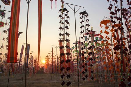 colorful tung flag with beautiful sky backgroundの写真素材