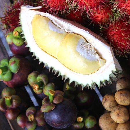 famous Thai fruit, durian mangosteen and rambutan on wooden tableの写真素材