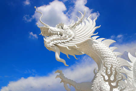 white dragon in chinese temple with beautiful sky backgroundの写真素材