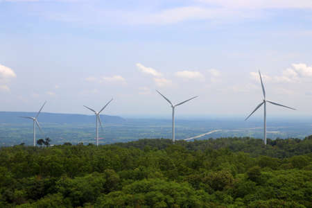 windmill for renewable energy with beautiful sky background