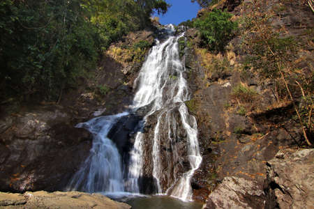 landscape photo, amazing waterfall in green forest