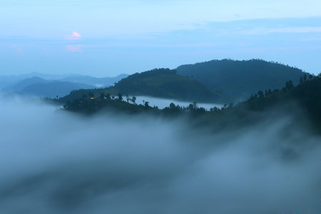 landscape photo, misty mountain hills in the morning