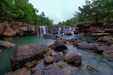 landscape photo, waterfall in green forestの写真素材