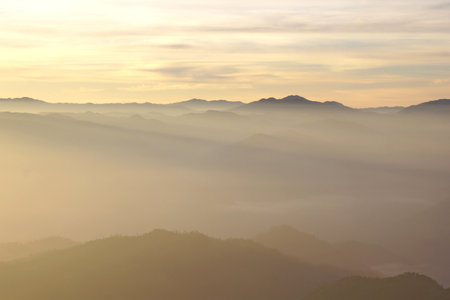 landscape photo, misty mountain hills in the morningの写真素材