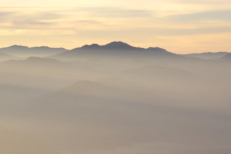 landscape photo, misty mountain hills in the morningの写真素材
