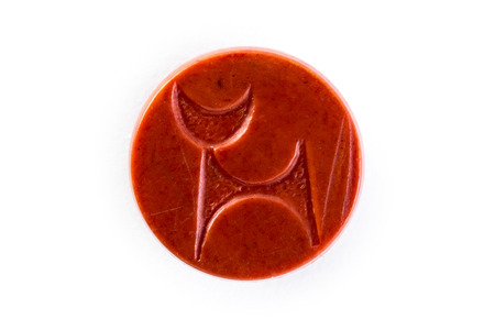 red button on a white backgroundの写真素材