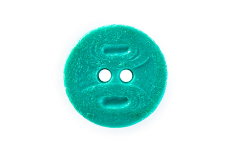 aquamarine button on a white backgroundの写真素材