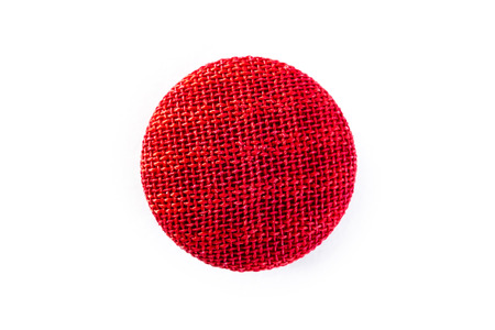 striped red button on a white backgroundの写真素材