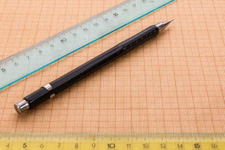 mechanical pencil and ruler on graph paperの写真素材
