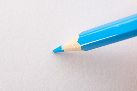 blue pencil on a white background closeupの写真素材