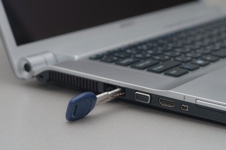 The laptop and keyの写真素材