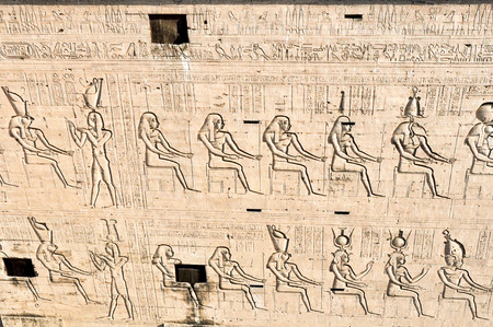 The bas-reliefs on the walls in the Ancient temple Karnak in Luxor. Egypt.