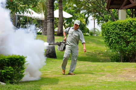 Nha Trang, VIETNAM - SEPTEMBER 28,2013: Spraying at a man from insectsのeditorial素材