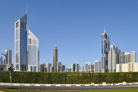 DUBAI, UAE - MARCH 10,2012: the architecture of the skyscrapers and buildings on the main street of Dubai-Zayed roadのeditorial素材