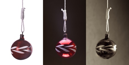 hung reg christmas ball set on the white, dark and brown backgroundの写真素材