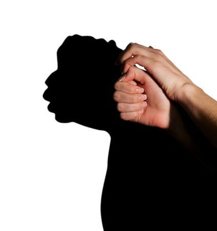 silhouette shadow of thick man from young womans handsの写真素材