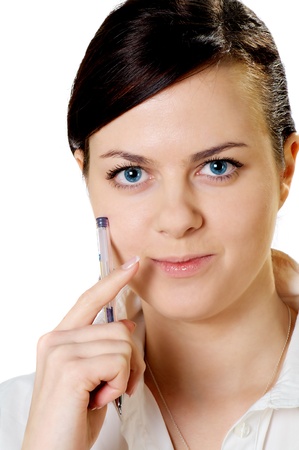 thoughtful smille business girl in white blouse with pen isolated on whiteの写真素材