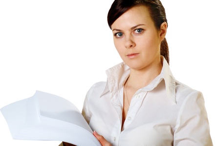 yonug girl in white blouse with sheets of white paper isolated on white backgroundの写真素材