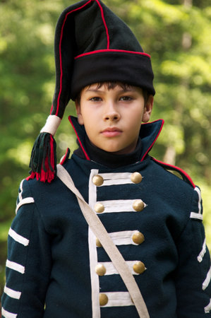 kid in form arillerymen on celebration of 750 anniversary of Guryevsk (Neuhausen O.P.) on June 30, 2012 in Guryevsk, Kaliningradskaya oblast, Russiaのeditorial素材