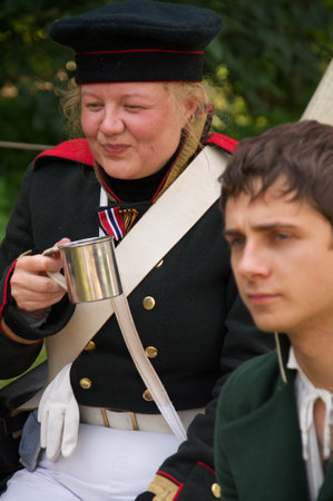 people in form arillerymen on celebration of 750 anniversary of Guryevsk (Neuhausen O.P.) on June 30, 2012 in Guryevsk, Kaliningradskaya oblast, Russiaのeditorial素材