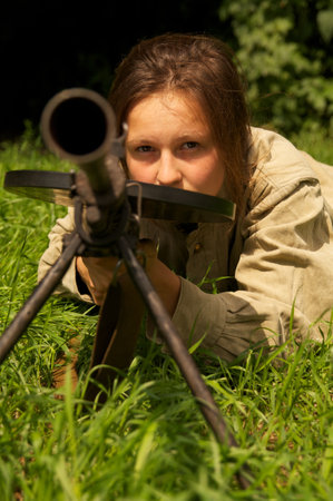 girl with gun on celebration of 750 anniversary of Guryevsk (Neuhausen O.P.) on June 30, 2012 in Guryevsk, Kaliningradskaya oblast, Russiaのeditorial素材