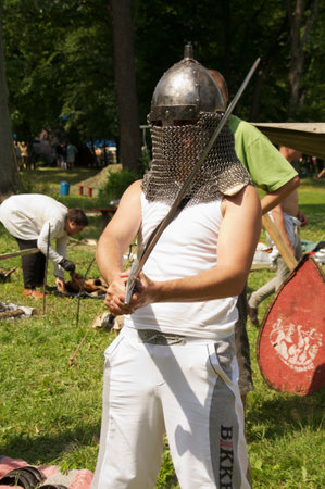 kid with sword on celebration of 750 anniversary of Guryevsk (Neuhausen O.P.) on June 30, 2012 in Guryevsk, Kaliningradskaya oblast, Russiaのeditorial素材