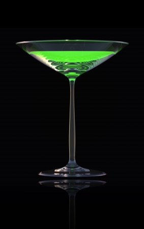 absinth in the glass on black backgroundの写真素材