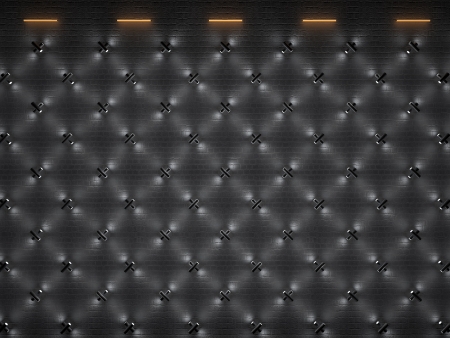 brick wall illuminated by lighting equipmentの写真素材