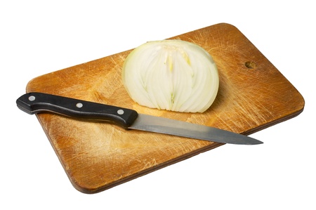 half of onion and knife, old wooden board isolated on white backgroundの写真素材