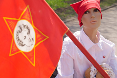 mannequin of komsomol girl in white blouse with red flagのeditorial素材