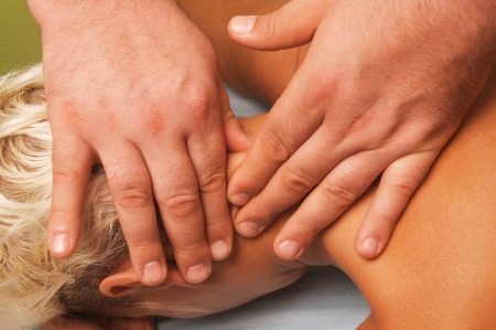 position of hands and fingers at massage of a female bodyの写真素材