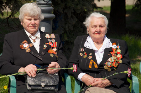 Kaliningrad, Russia - May 05, 2013 - mature women veteran of the World War II with his medals on during the victory celebrationのeditorial素材