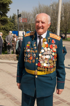 Kaliningrad, Russia - May 05, 2013 - veterans of the World War with medals walk at street on during the victory celebrationのeditorial素材