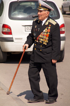 Kaliningrad, Russia - May 05, 2013 - veteran of the World War with medals walk at street on during the victory celebrationのeditorial素材