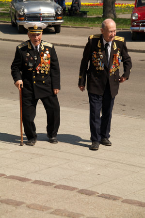 Kaliningrad, Russia - May 05, 2013 - veterans of the World War with medals walk at street on during the victory celebrationのeditorial素材