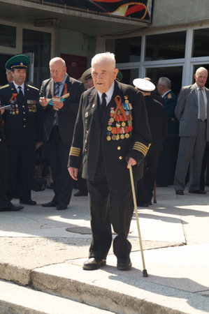 Kaliningrad, Russia - May 05, 2013 - veteran of the World War with medals walk at street on during the victory celebrationのeditorial素材