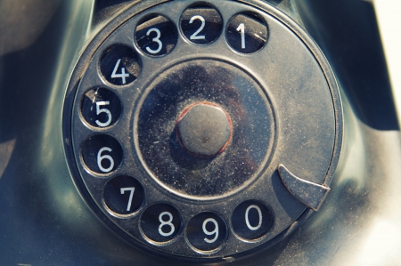 old dirty black retro telephone disk dealerの写真素材