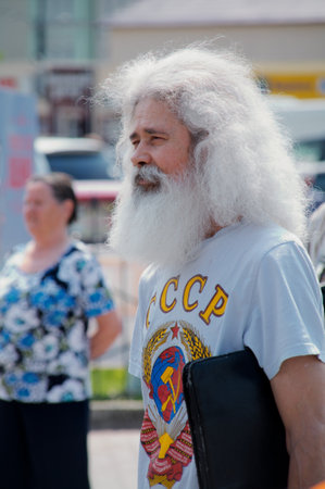 KALININGRAD, RUSSIA - JULY 14: man with a white beard on City Day of Kaliningrad celebration on July 14, 2013 in Kaliningrad, Russiaのeditorial素材