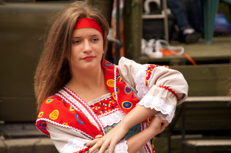 KALININGRAD, RUSSIA - JULY 14: girl in national dress danced on the street on City Day of Kaliningrad celebration on July 14, 2013 in Kaliningrad, Russiaのeditorial素材