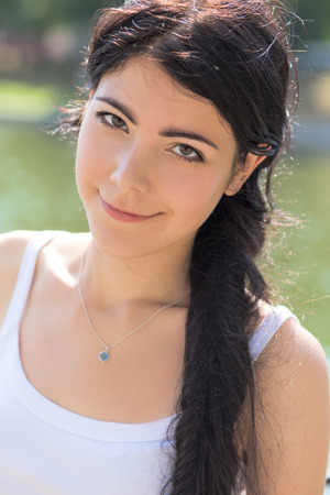 smiling pretty girl in sunlightの写真素材