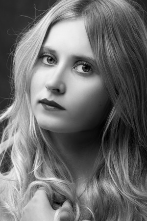 pretty luxury young blond woman portrait, monochrome imageの写真素材