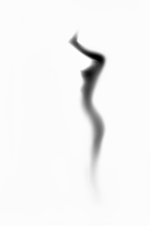 abstract female unrecognizable silhouette high key monochrome imageの写真素材
