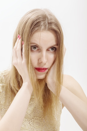 fun shocked young woman in frustrationの写真素材